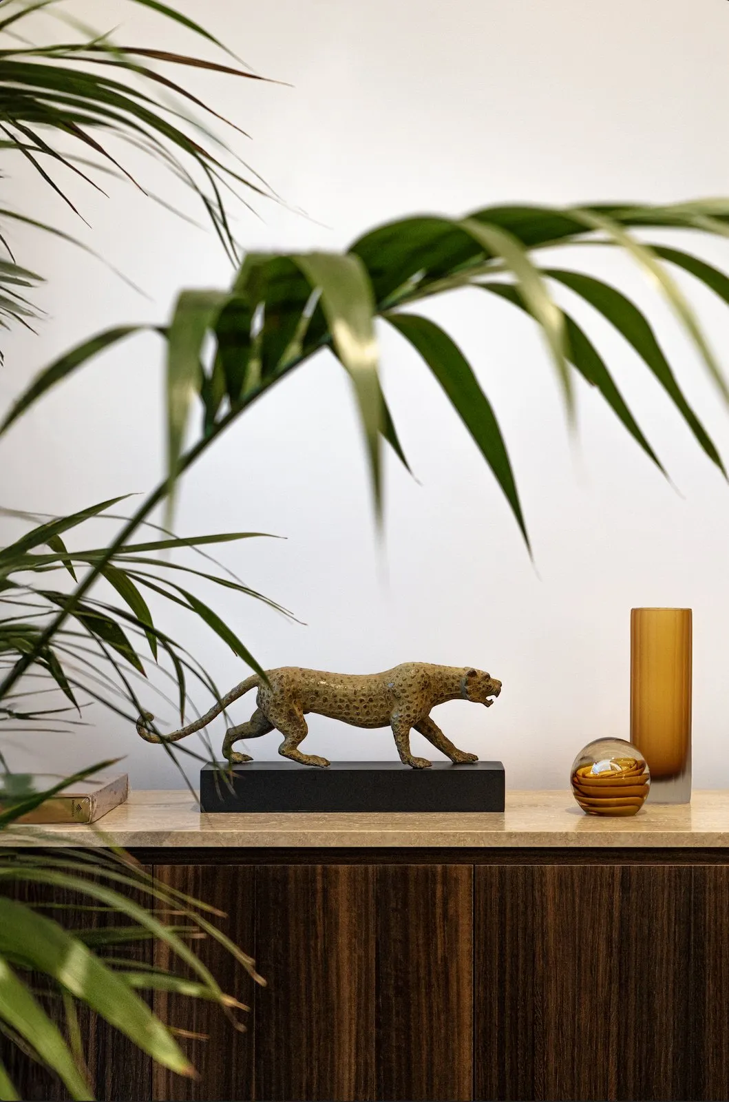Blackdoor Paris — a brass leopard on the sideboard.